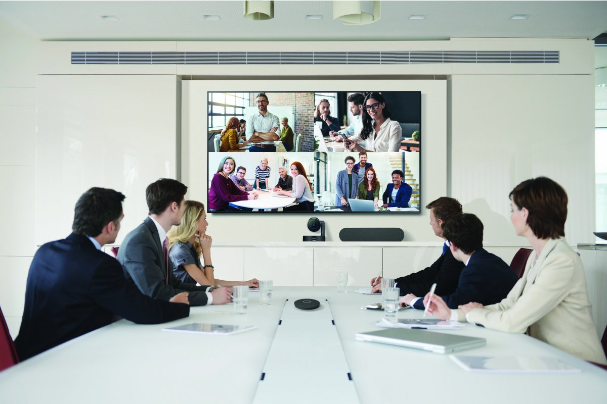 Board room of employees meet remotely on the 65" Premium Display QB Series television.