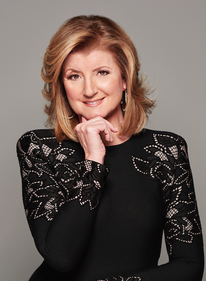 Arianna Huffington wearing lace dress smiling