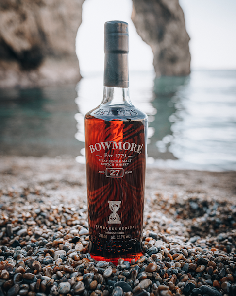 Bottle of Bowmore on beach