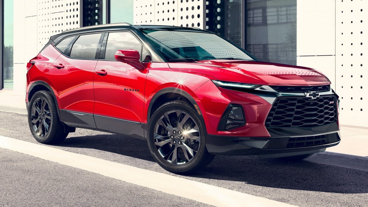 A red 2022 Chevy Blazer parked in a parking lot