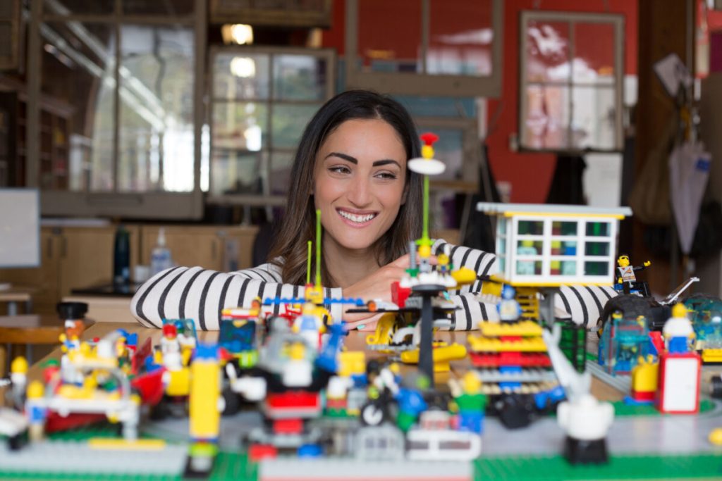 Twenty One Toys founder Ilana Ben-Ari looking at toys