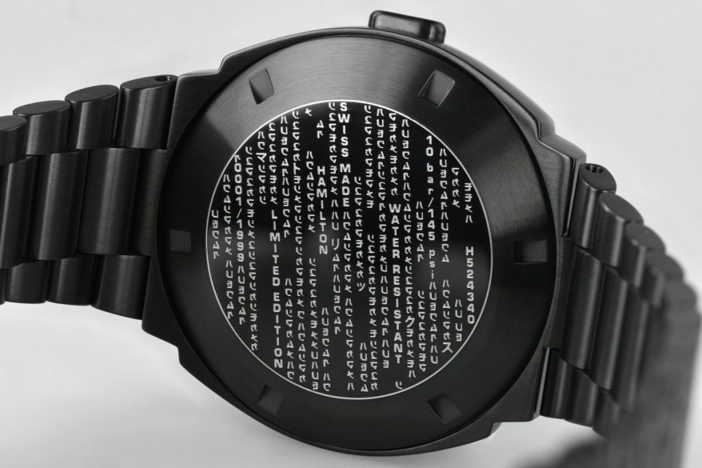 Back of watch with Matrix-inspired writing