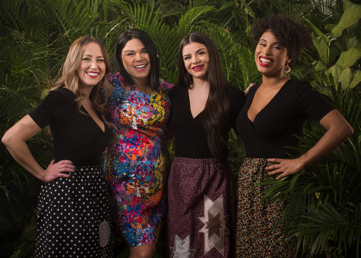 Four women, standing together and smiling. Cheekbone Beauty founder, Jenn Harper, and three models.