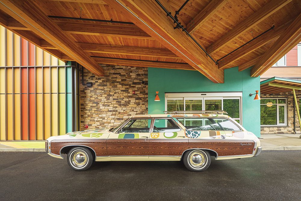 Motel driveway with retro stationwagon