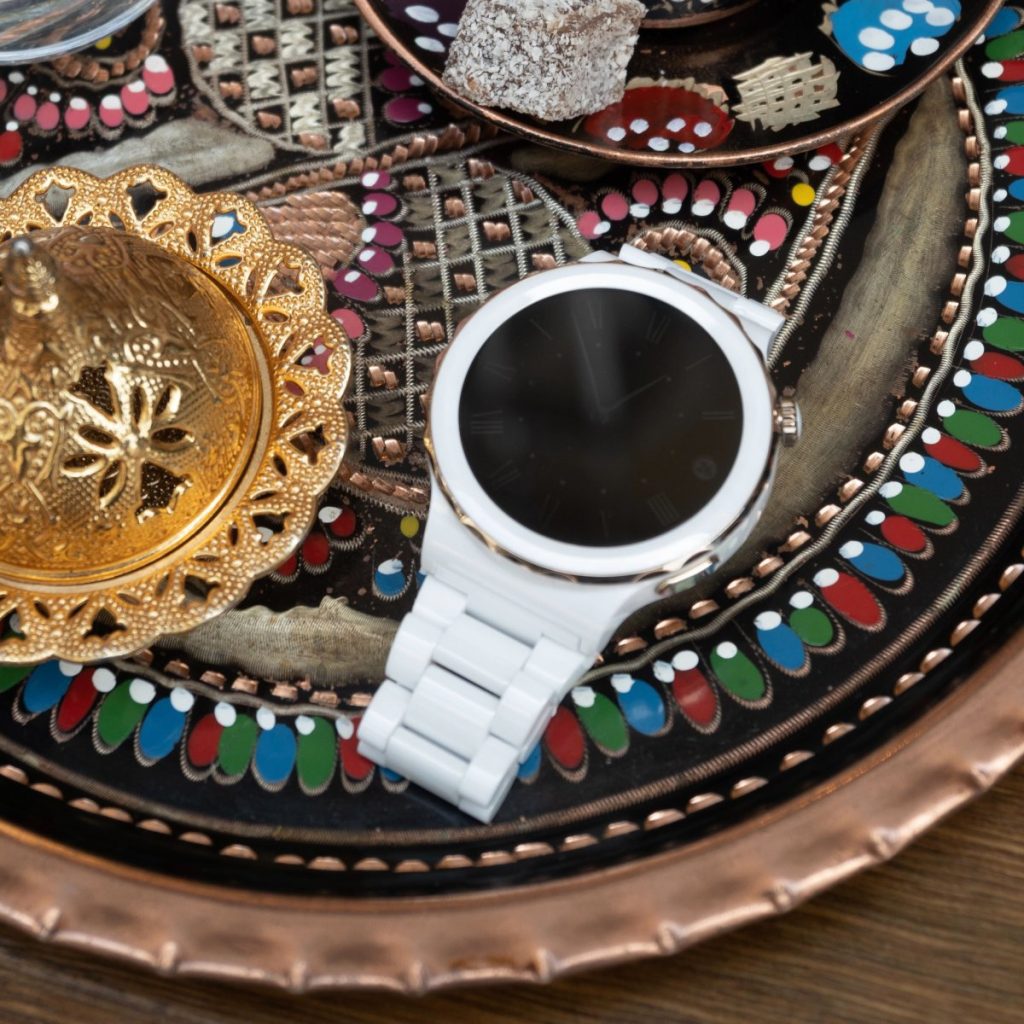 HUAWEI Watch GT3 Pro lying on a Turkish teaset