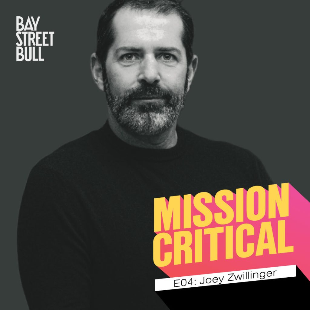 Joey Zwillinger black and white photo with Mission Critical branding
