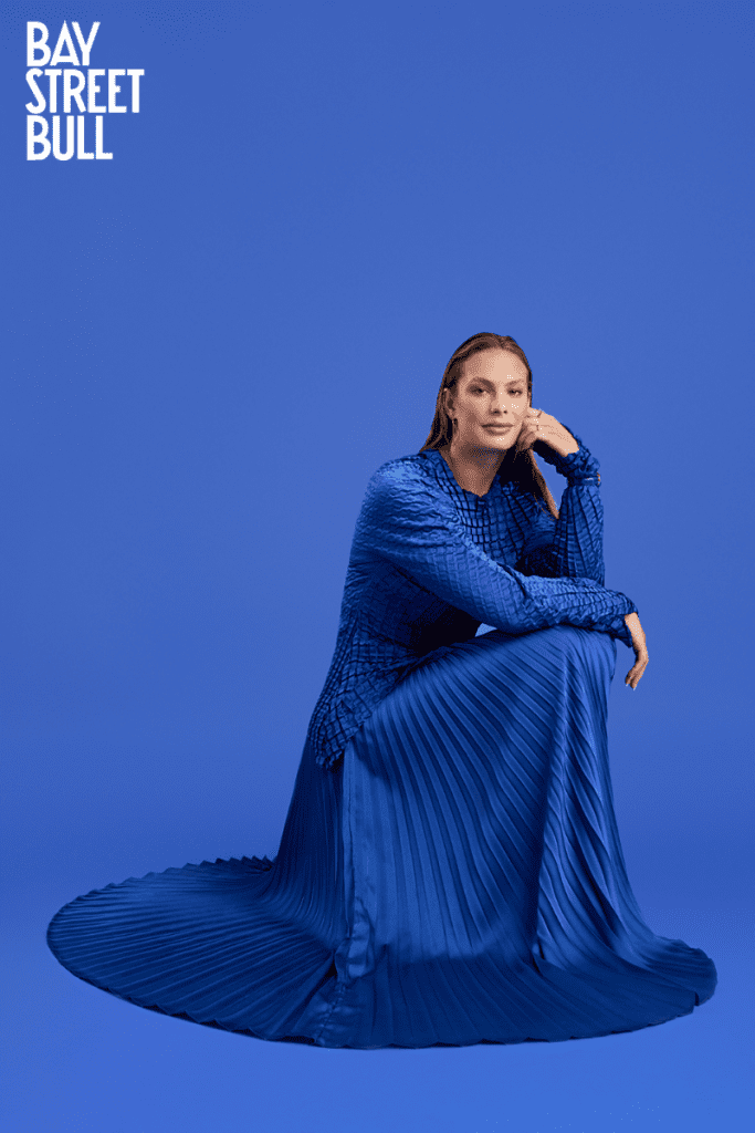 Penny Oleksiak in blue dress
