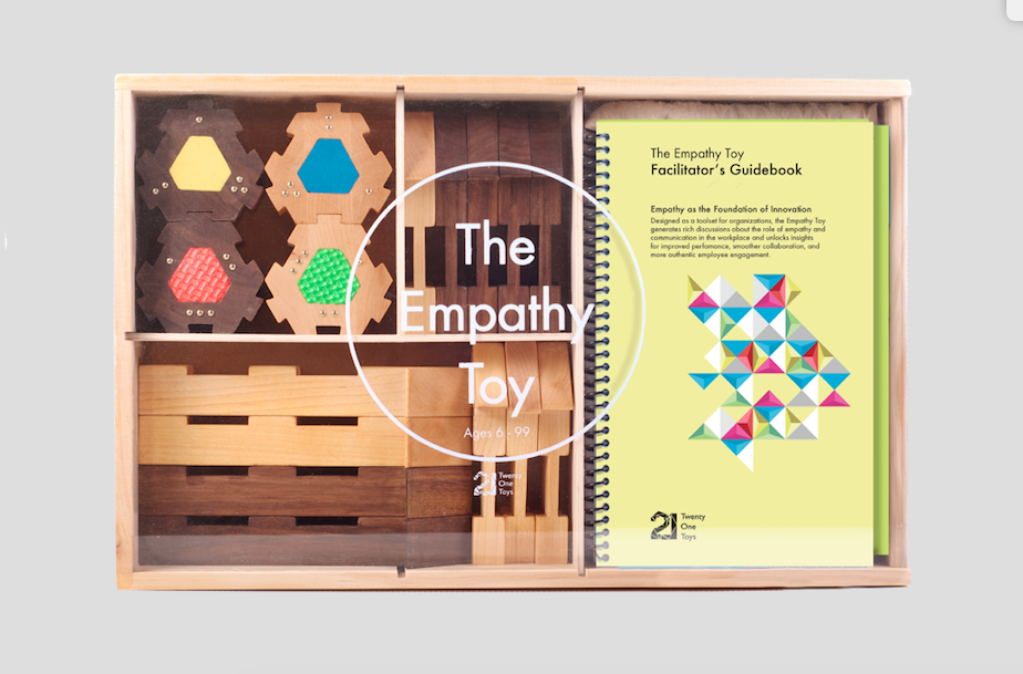 Packaging for Twenty One Toys Empathy Toy with wooden blocks and manual