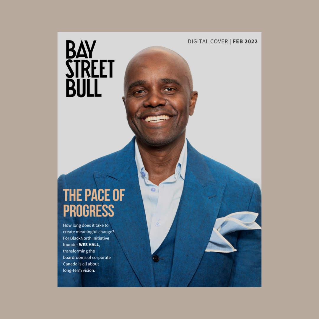 Magazine cover with Wes Hall smiling in blue suit against brown background