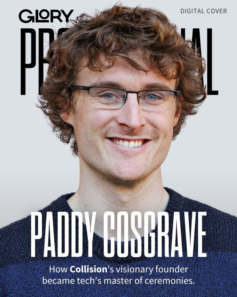 Glory Professional Magazine cover featuring a headshot of Paddy Cosgrave. He is wearing thin wire frame glasses, has curly brown-red hair and is smiling in a blue shirt. He is set against a light grey background with his name across the cover.